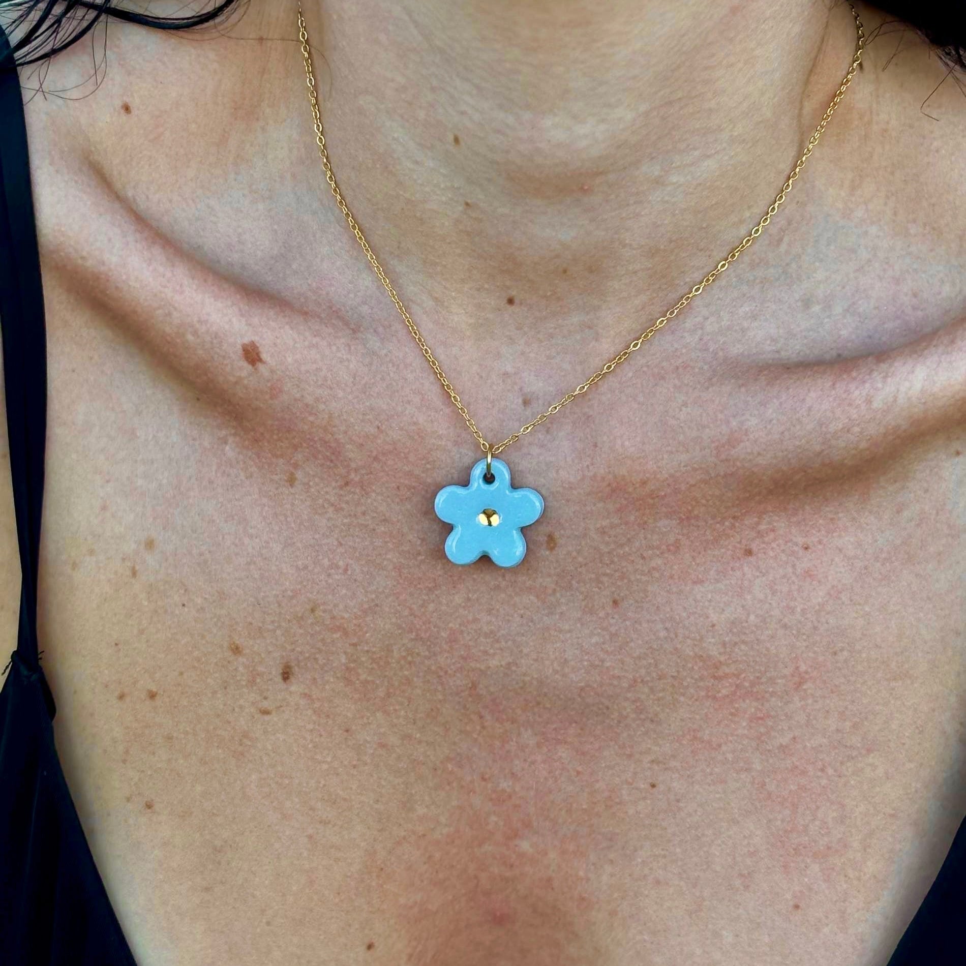 Margherita | Handcrafted light blue floral ceramic necklace with golden detail
