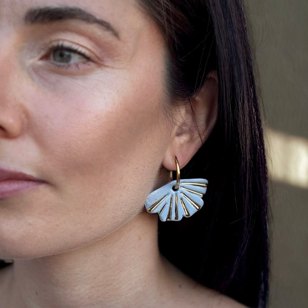 Selene | Handcrafted light blue ceramic dangle earrings with golden details